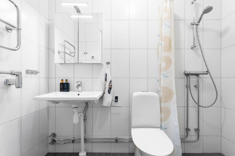 Läggning av värmegolv i badrum vid nybyggnation. Enskede, Stureby i Stockholm